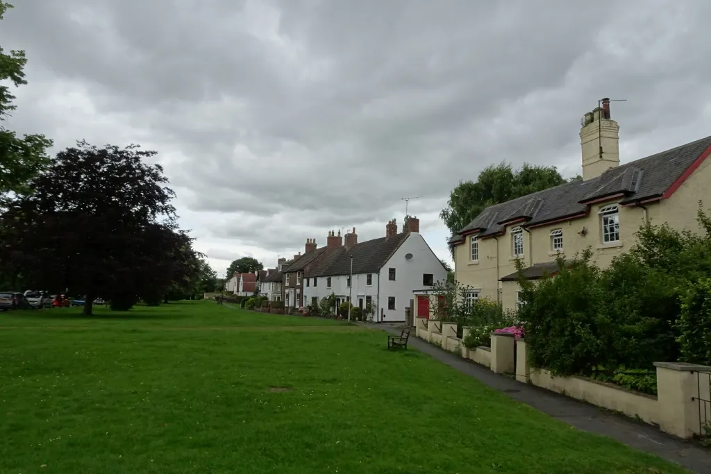 Houses along the village green in Romanby