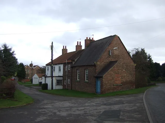 The Old School House, a brick building in the middle of Yafforth